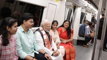PM Modi takes Delhi Metro to attend event