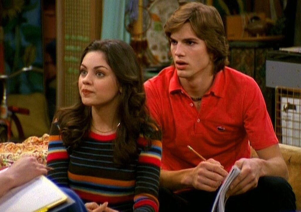 Ashton Kutcher with wife Mila Kunis in the '70s show