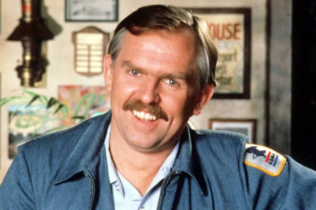 John Ratzenberger as mailman in Cheers